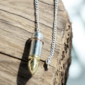 Pendule acier, cuivre et laiton